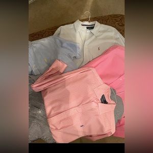 Five men’s polo shirts